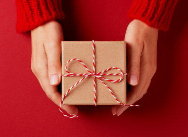 kraft paper gift on red background