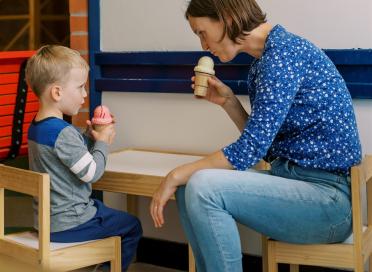 child and parent with ice cream